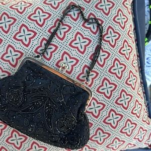 Le Regale beaded kiss lock clutch